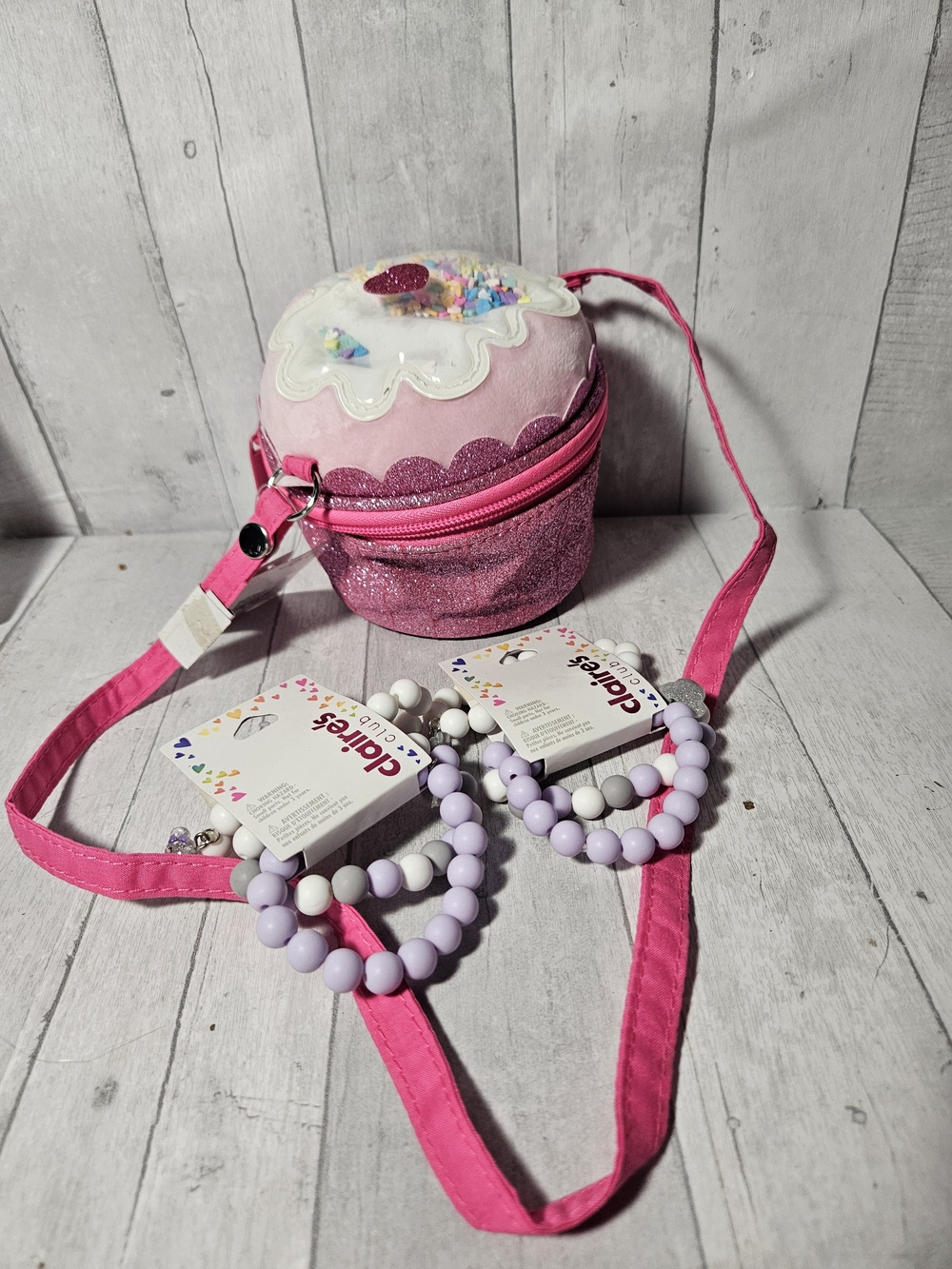 Claire's Pink Glitter Cupcake Crossbody Bag with Lilac Bead Bracelets